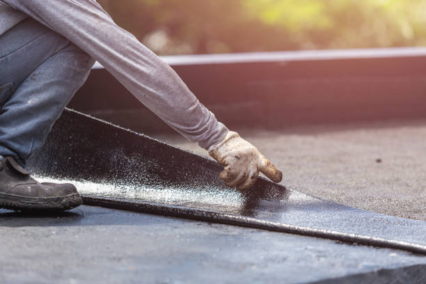Professional Basement Waterproofing technician working in Benton, TN